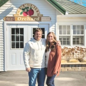 Denny and Emily Stucky with the Community Orchard