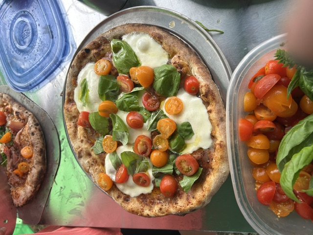 Homemade dough, pizza sauce & homegrown San Marzano tomatoes, garlic, basil and oregano.