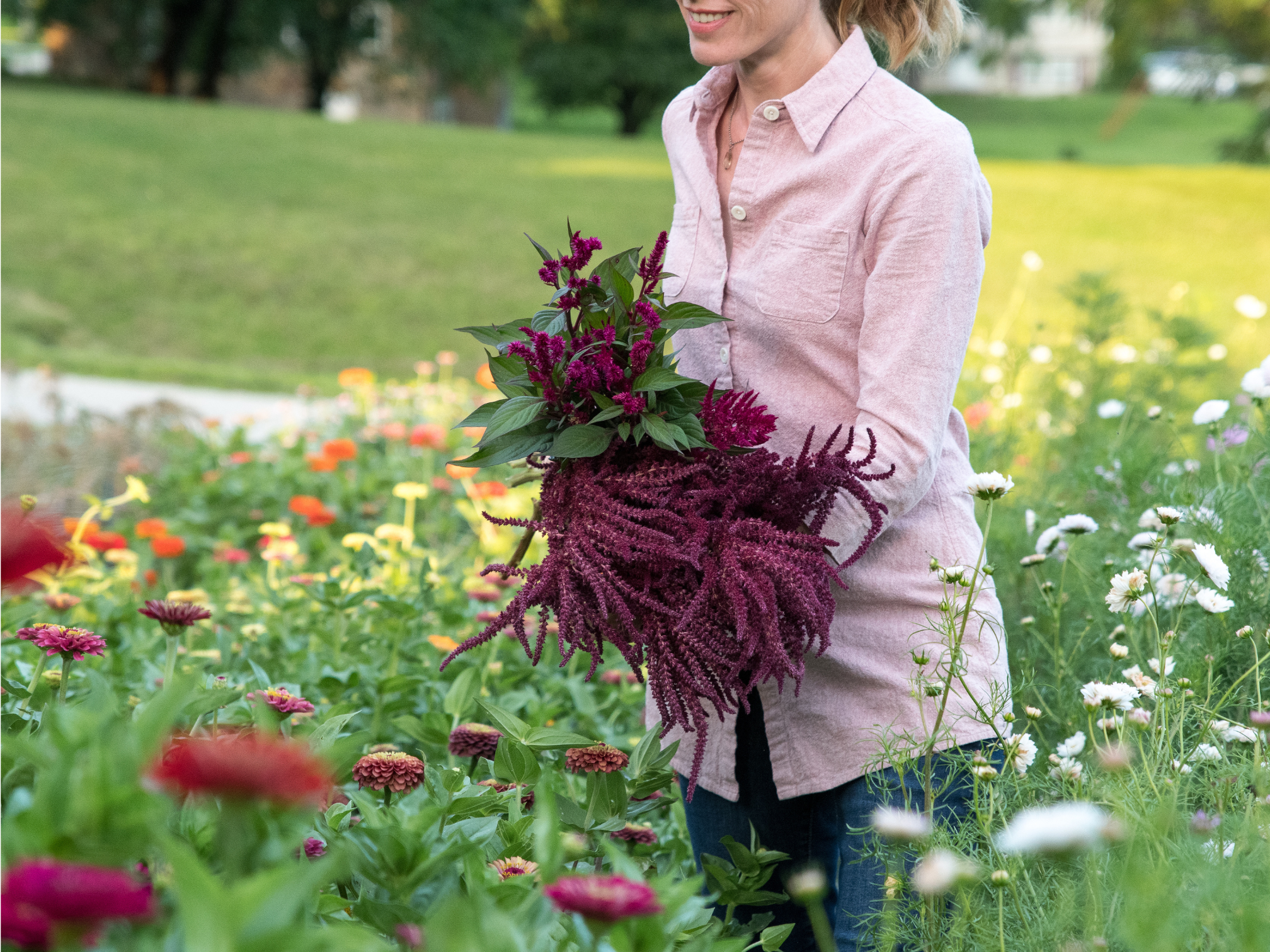 Lacey Bell enjoys cutting her flowers to sell to customers.