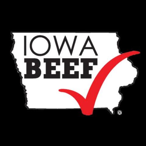 A white shape of the state of Iowa with a red check mark in the lower right quadrant and the phrase "Iowa Beef" in the upper left quadrant of the state shape.