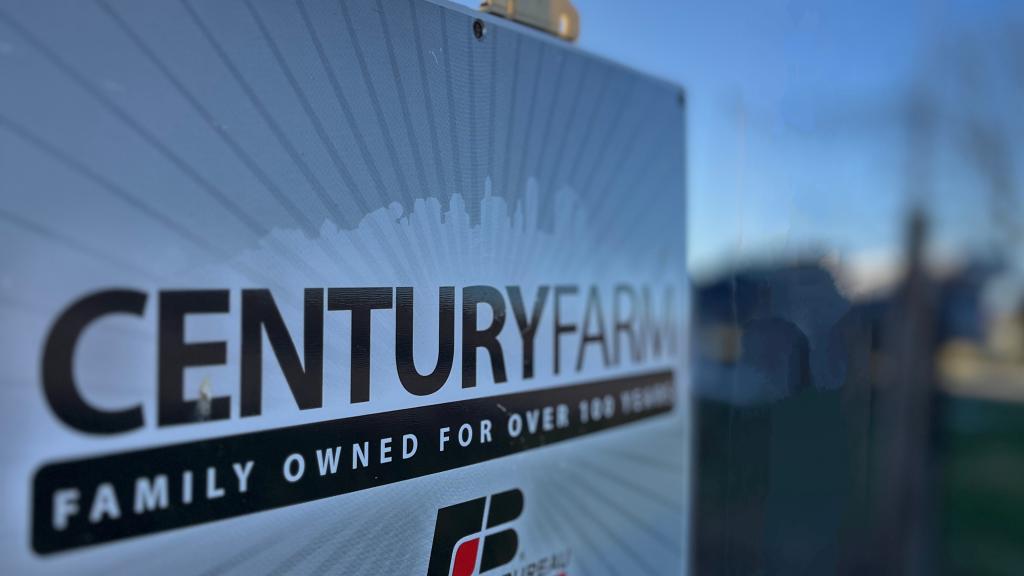 Century Farm sign with American Flag