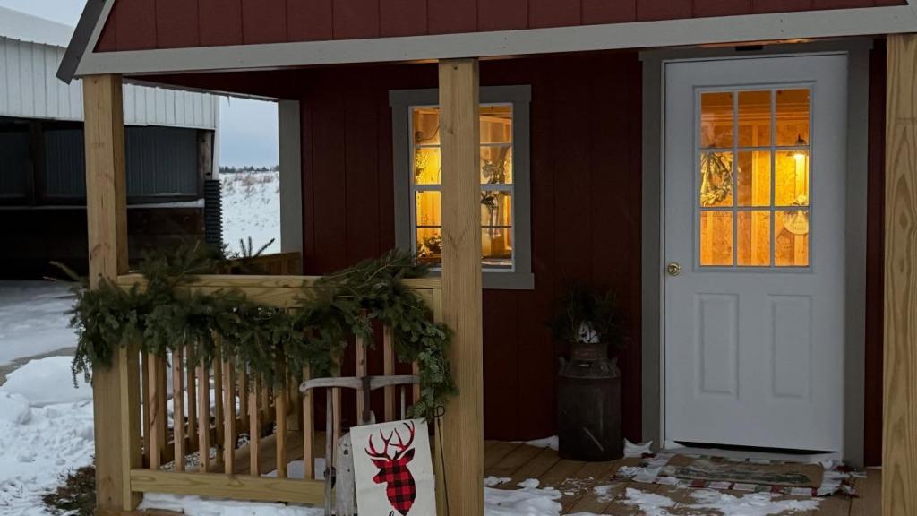small shed with porch used as a farm stand