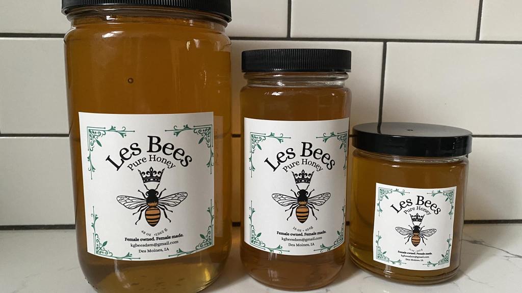 Jars of honey in various sizes with labels from Les Bees