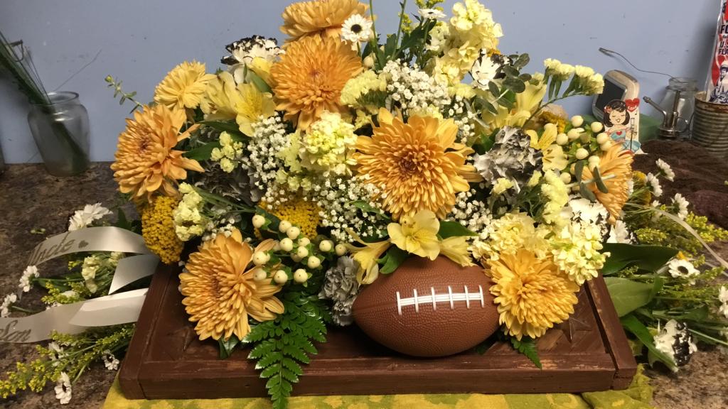 Floral arrangement for football fan